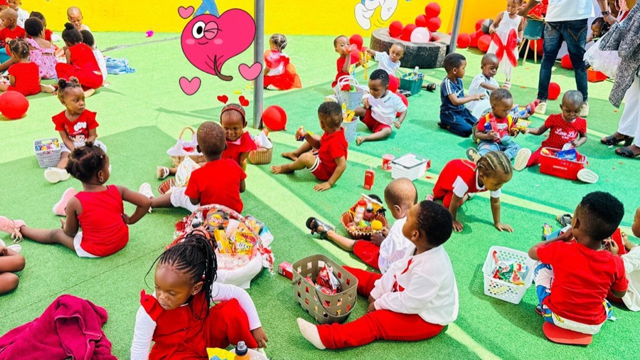 Children eating together on the turf